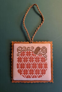 finished Quaker pumpkin cross stitch