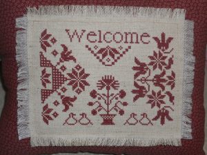 Quaker motif welcome cross stitch
